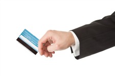 expense-management-software | Photo Courtesy of Depositphotos http://depositphotos.com/3856254/stock-photo-Man-in-suit-holding-credit-card.html?sst=120&sqc=280&sqm=15336&sq=11iu5h