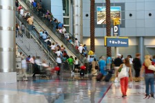 business-travel	|	Photo Courtesy of	Depositphotos	http://depositphotos.com/11340664/stock-photo-Blurred-crowd-moving-up-an-escalator.html?sqc=4&sqm=310&sq=1th1jp