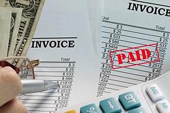 automated-invoicing-software|Photo Courtesy ofDepositphotoshttp://depositphotos.com/5173332/stock-photo-Paid-invoice.html?sqc=7