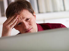 stress-free-invoice-management|Photo Courtesy ofDepositphotoshttp://depositphotos.com/10302684/stock-photo-Business-man-having-headache-in-office.html?sst=60