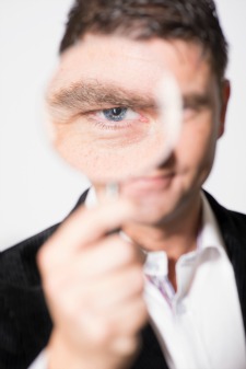 executive-expense-tracking	|	Photo Courtesy of	Depositphotos	http://depositphotos.com/21729001/stock-photo-Serious-looking-man-watching-with-magnifying-glass.html?sq=165mo9 