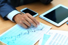 mobile-expense-reporting	|	Photo Courtesy of	ThinkStock	http://www.thinkstockphotos.com/image/stock-photo-young-businessman-working-with-modern-devices/458872349/