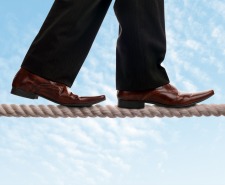 CFO-Strategy-Finance-Accounting	|	Photo Courtesy of	Depositphotos	http://depositphotos.com/31687255/stock-photo-Tightrope-walker-businessman.html?sqc=41&sqm=535&sq=23c08b